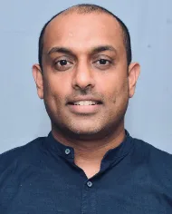 Dr. Jubi John